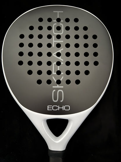 Close up studio shot of the SKRATCH ECHO padel racket with a matte black carbon face and mist grey pearlescent frame.